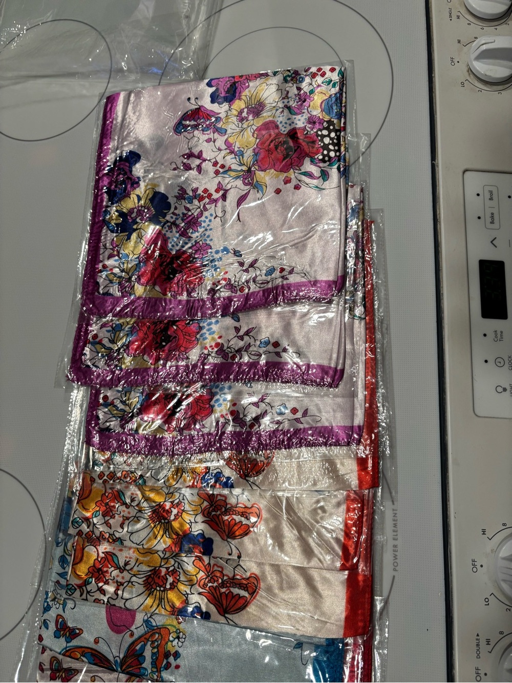 12 scarfs, brand new wrapped individually